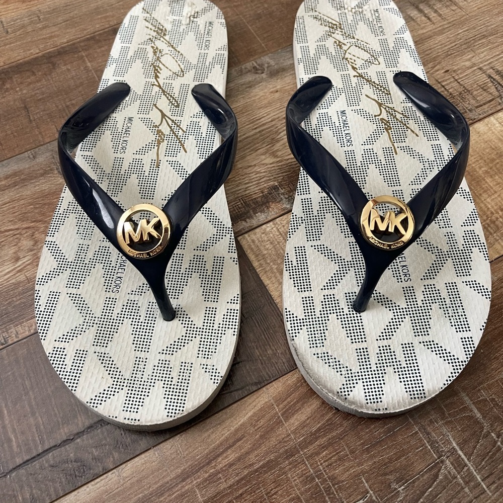 Michael Kors Navy and White  Strappy Flip Flops with Gold MK Emblems